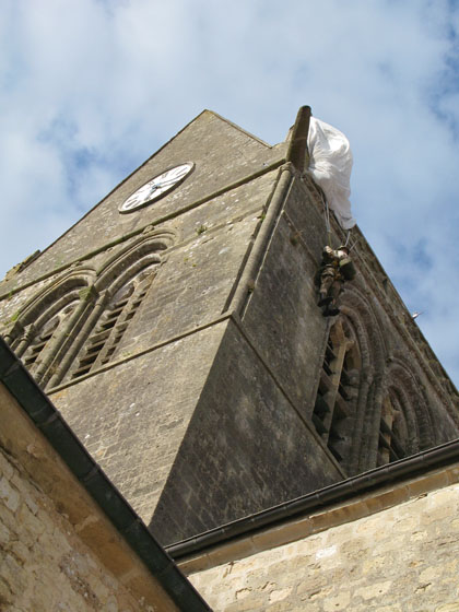 The parachute of paratrooper John Steele was caught on the church's roof