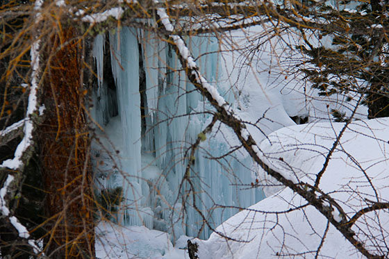 Frozen cascade near the tiny village Zmutt